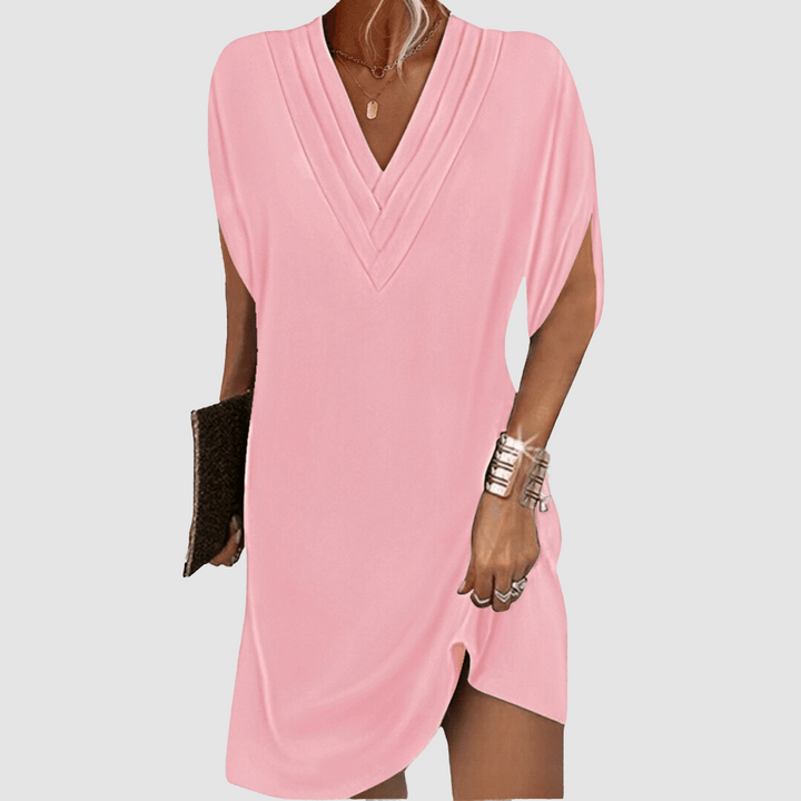 Pink V-neck half-sleeve dress with draped wrap-look neckline and short curved hem