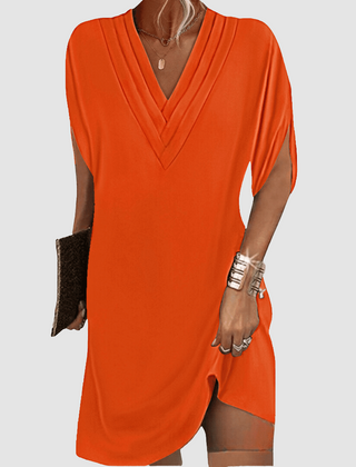 Orange V-neck half-sleeve dress with draped wrap-look neckline and short curved hem
