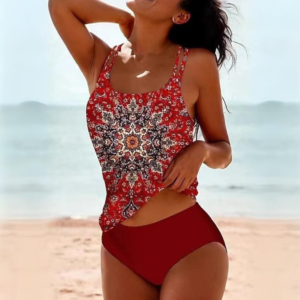 Red floral patterned one-piece swim set with scoop neck and solid red bottoms