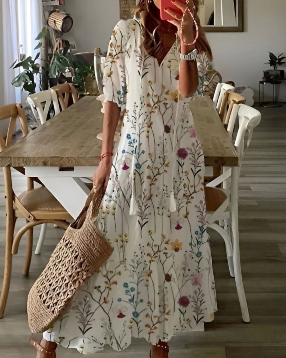Boho covering dress in white with colorful sprig print and short sleeves.