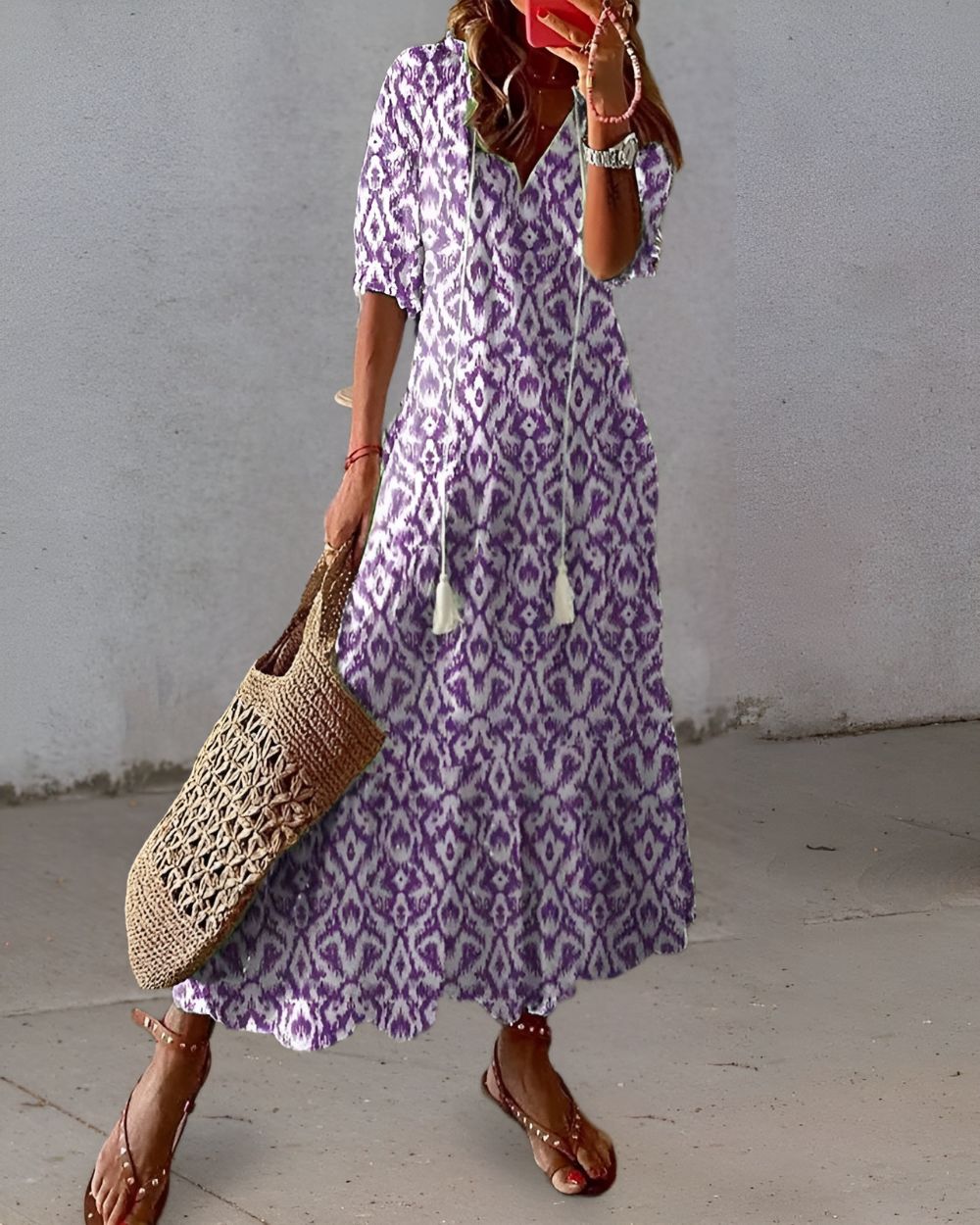 Boho covering dress in purple with diamond pattern and short sleeves.