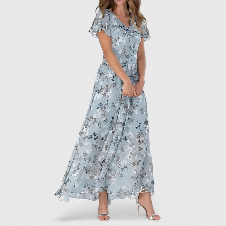 Evelyn™ luxe maternity dress in blue floral with ruffle cap sleeves and V-neck
