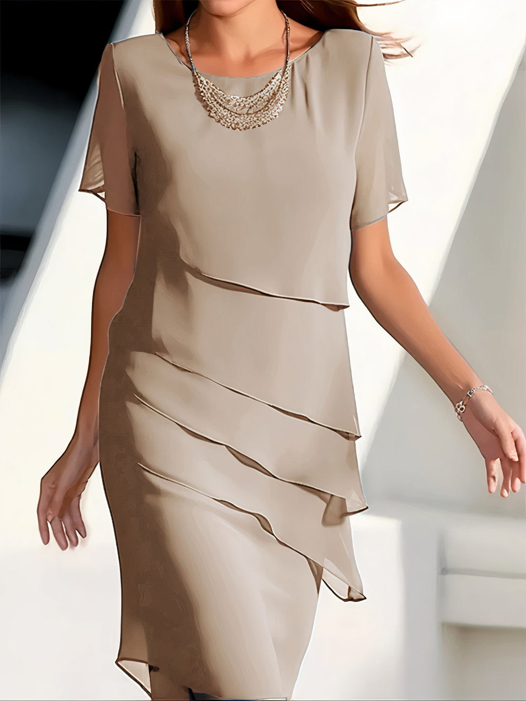 Beige silk chiffon pleated dress with short sleeves and draped ruffle front