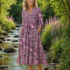 Pink patterned midi summer dress with V-neck and three-quarter sleeves