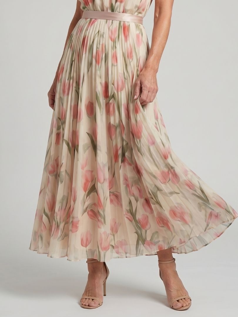 Floral midi skirt portion with pink tulip prints on light cream background, pleated