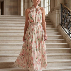 Floral halter-neck midi dress with high neckline and flowing pleated hem