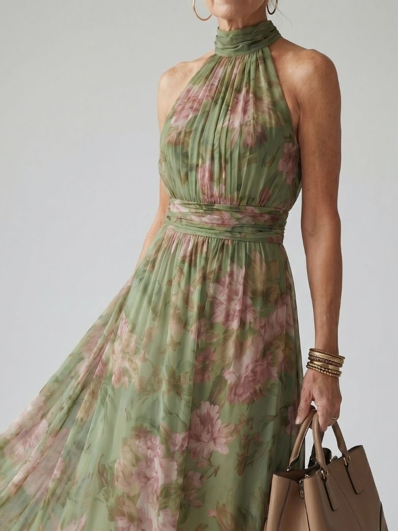 Sage green halter midi dress, gathered bodice and flowing skirt with pink floral print