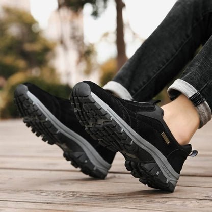 Lilian orthopedic shoes, black slip-on sneaker with rugged outsole and side logo patch