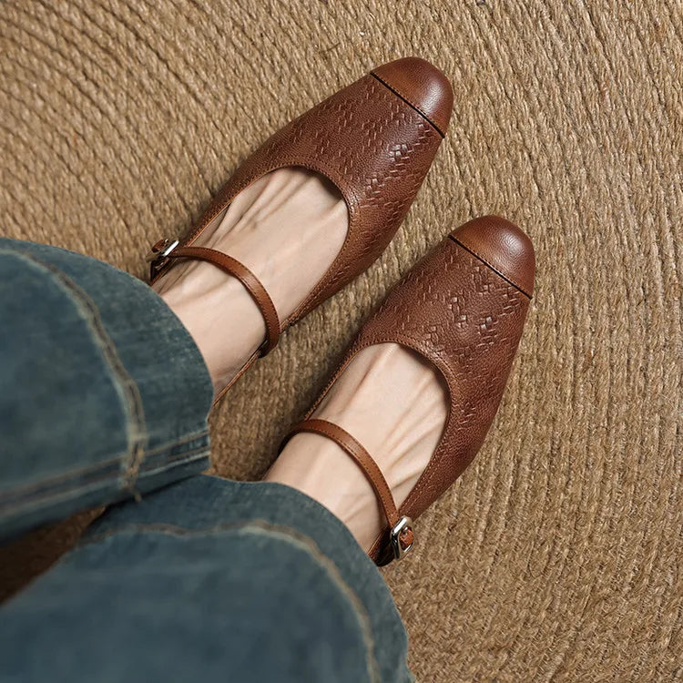 Brown leather mules with textured detail and ankle strap, square toe