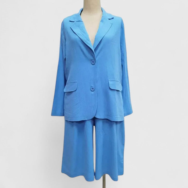 Blue 2-piece suit set with short blazer and wide-leg shorts, V-neck styling