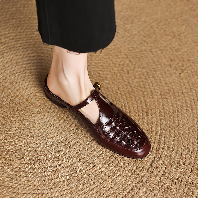 Brown leather mule on foot showing braided vamp detail and rounded toe