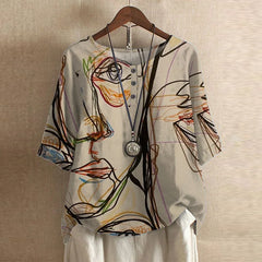 Women’s blouse with short sleeves, button front, and vintage floral line-art print