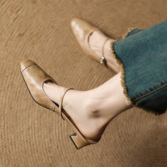 Apricot leather mule showing square toe and ankle strap with small buckle