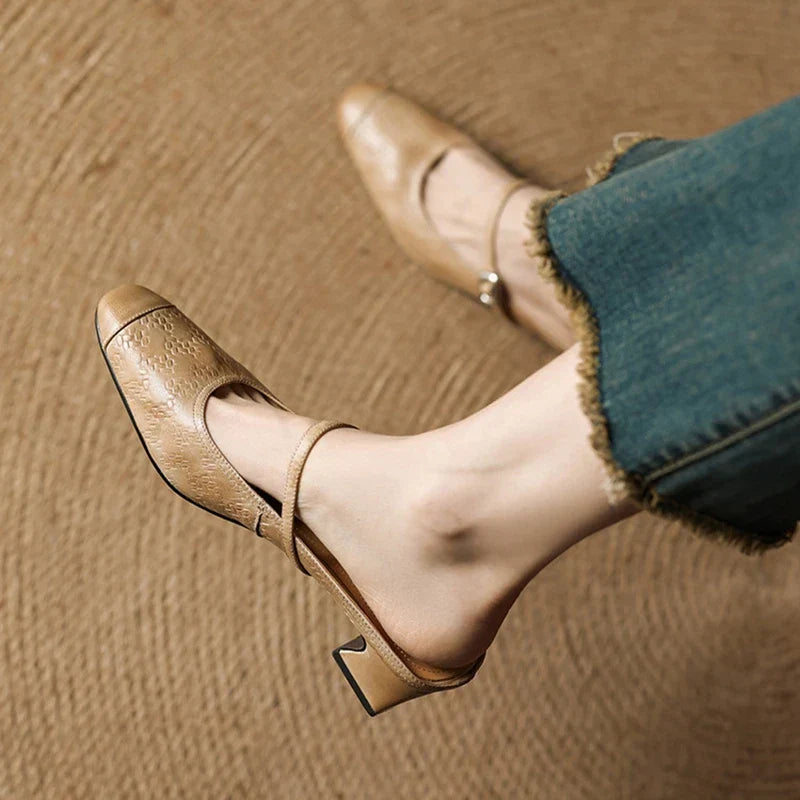 Apricot leather mule showing square toe and ankle strap with small buckle