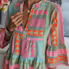 Women's geometric-print tiered dress, teal base with pink and orange accents