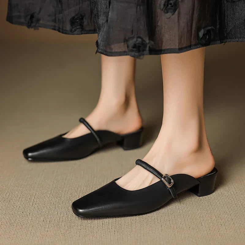 Black genuine leather Mary Jane mules with pointed toe, buckled ankle strap, block heel
