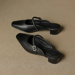 Black genuine leather Mary Jane mules with sling strap and block heel