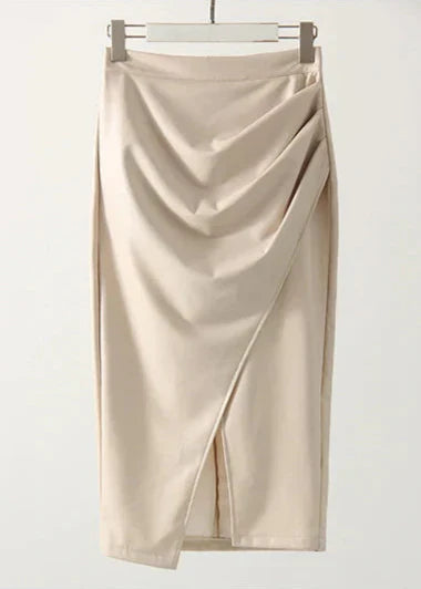 Cream leather midi skirt with draped front, diagonal seam, and front slit
