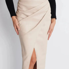 Beige leather pencil skirt with front slit and draped diagonal seam at waist