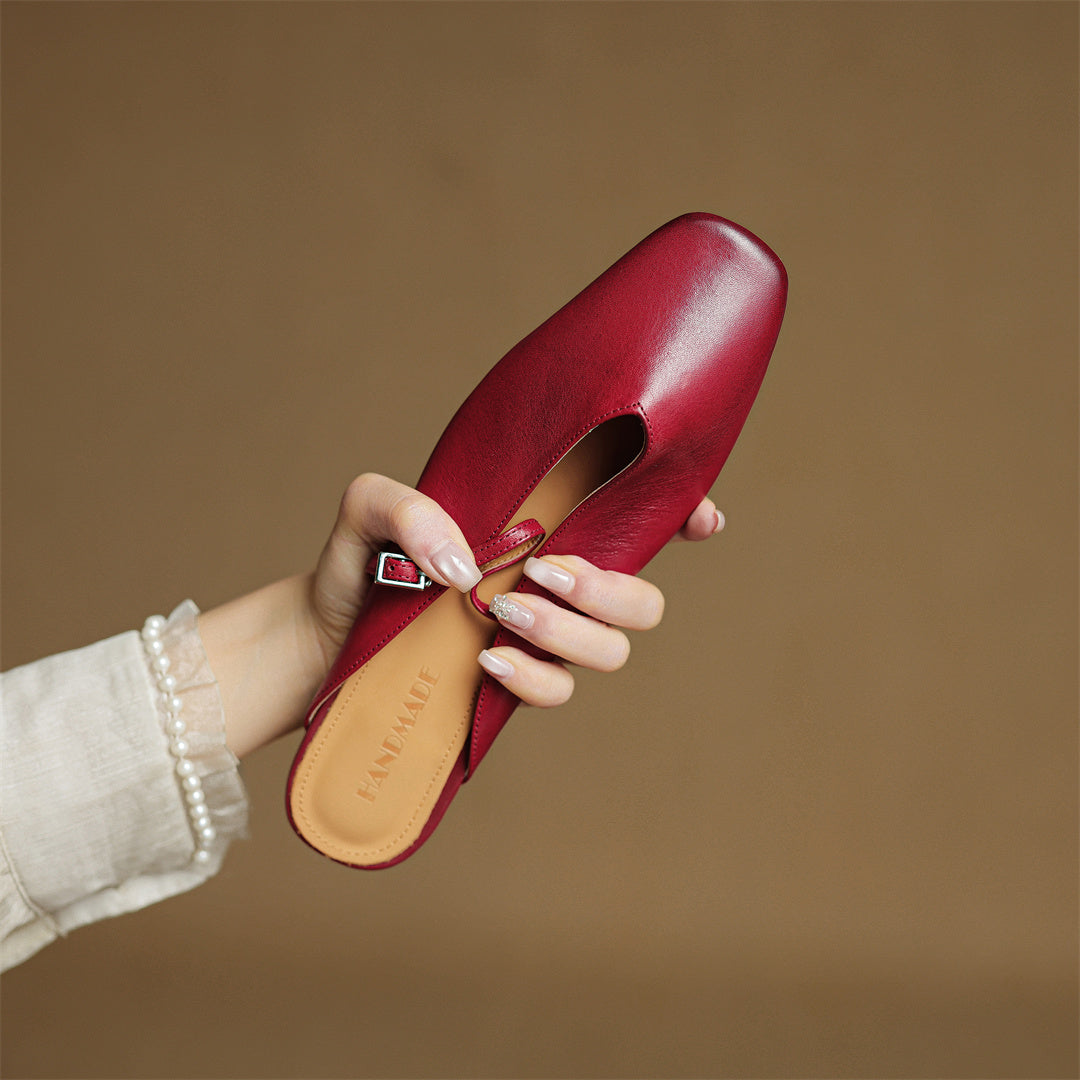 Maroon leather mule insole view with strap and buckle closure