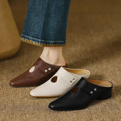 Leathe mules set: brown, white, and black with side cutouts and stud accents, low heel