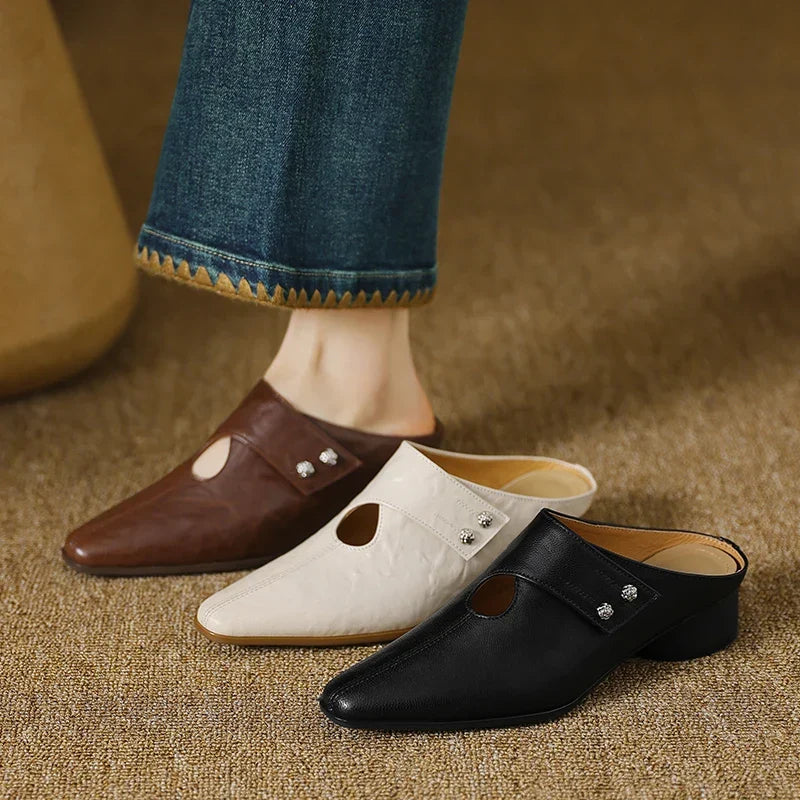 Leathe mules set: brown, white, and black with side cutouts and stud accents, low heel
