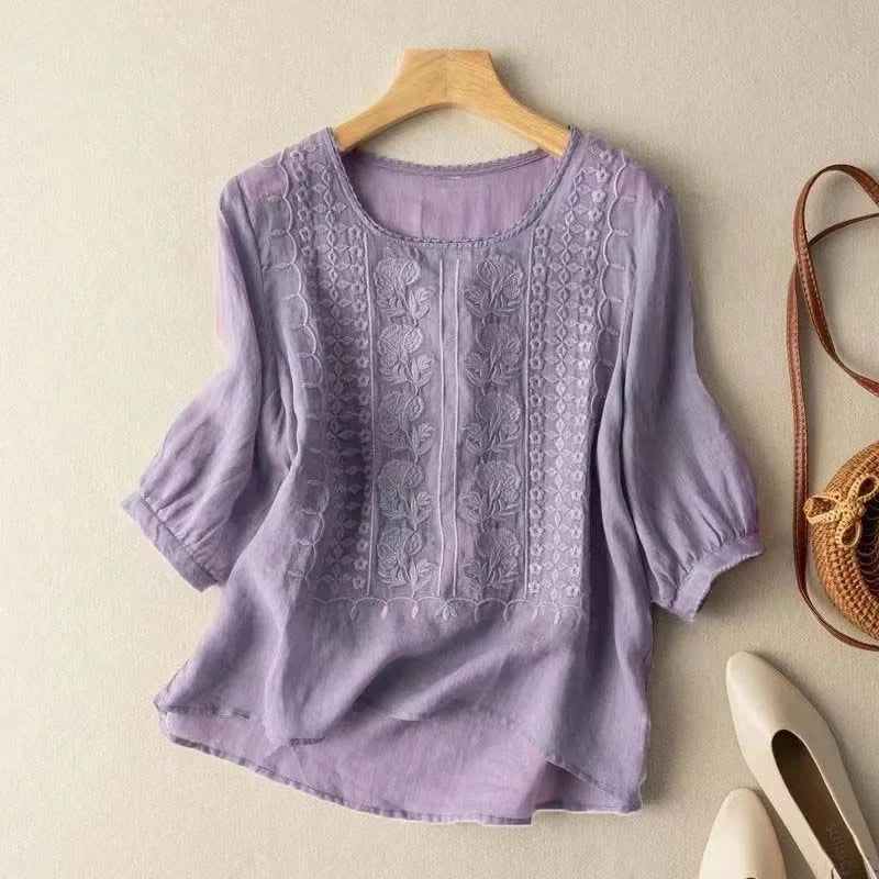 Lavender elegant soft blouse with round neck, lace-like embroidered vertical panel, half sleeves