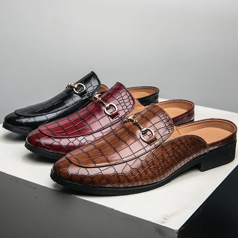 Genuine leather mules in black, red, and brown with croc-embossed finish and buckle straps.