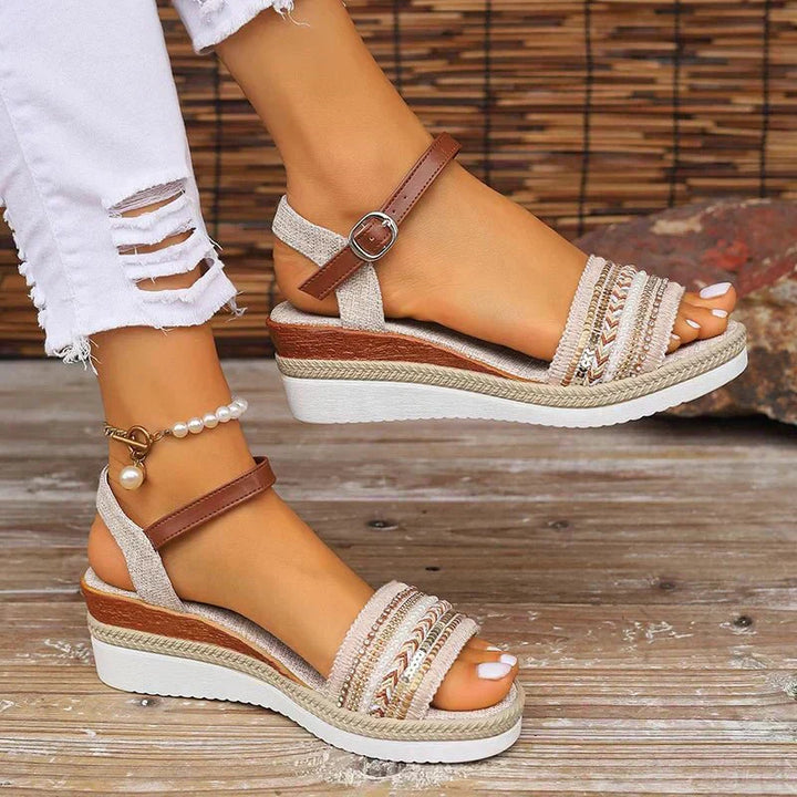 Woven espadrille wedge sandals with brown buckle straps and multicolor woven side panels
