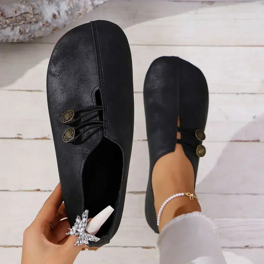 Women’s orthopedic suede loafers, black lace-up with decorative medallion detail