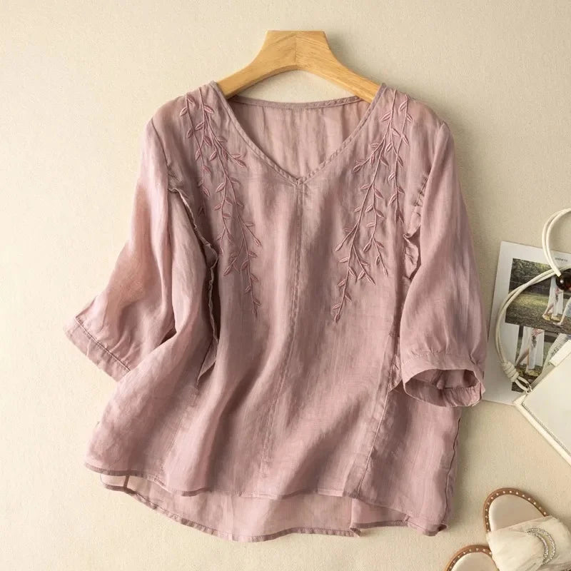 Loose lilac cotton-linen top with V-neck and leaf embroidery along the front
