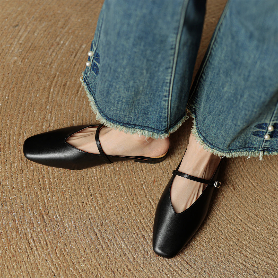 Miral genuine leather mules in black, pointed flats with sling strap and buckle