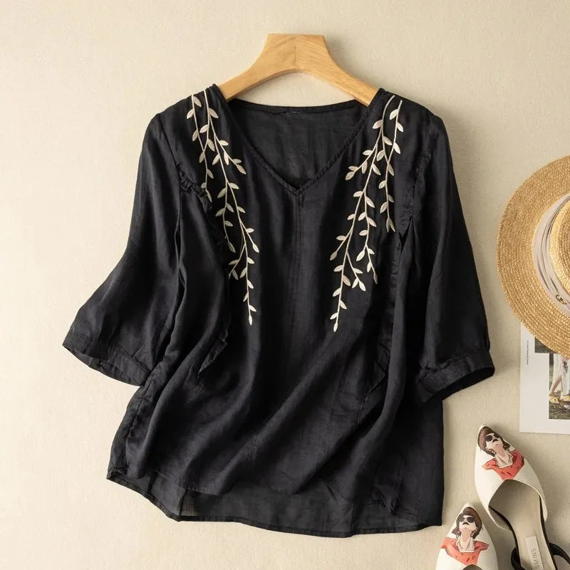 Loose retro cotton-linen top in dark navy with leaf embroidery at the neckline