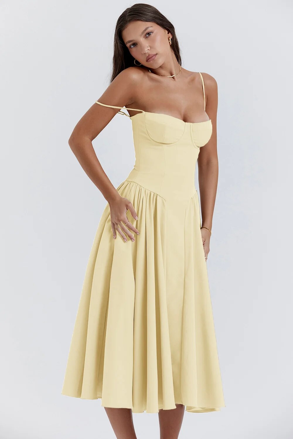 Yellow corset sundress with sweetheart neckline and gathered pleated midi skirt