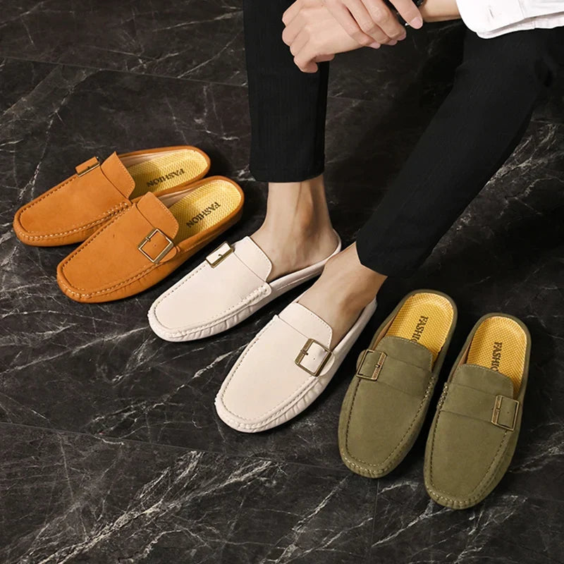 Assorted suede mules in orange, beige, and green with square buckle straps