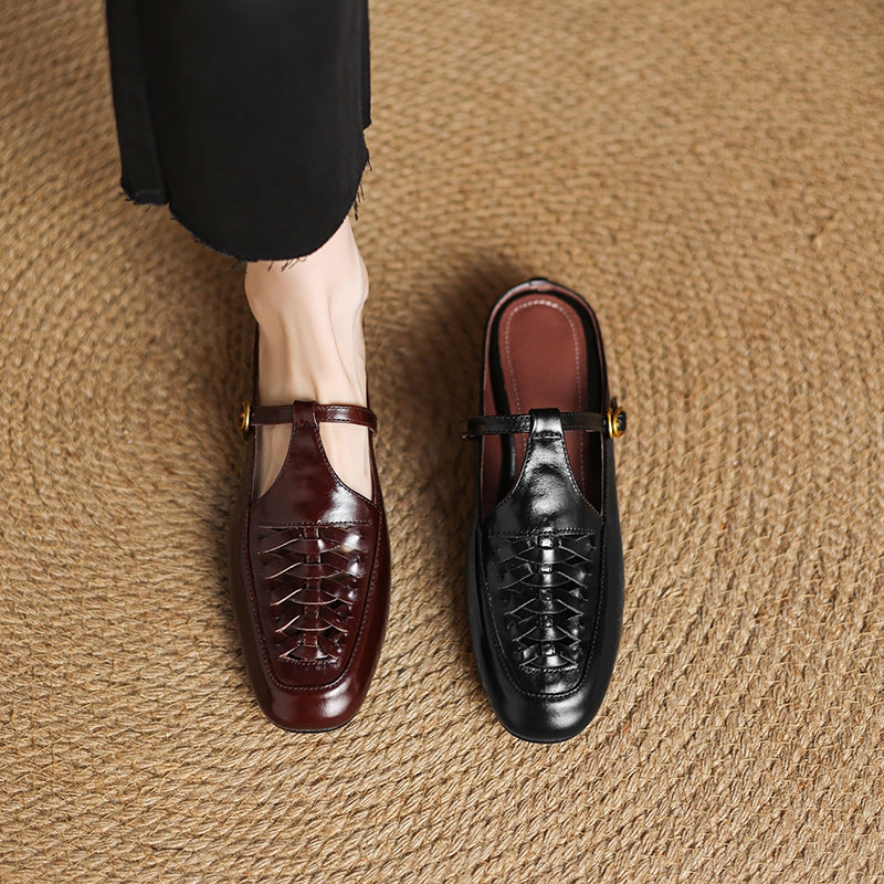 Brown and black leather mules with lace-up front, low heel, and side strap