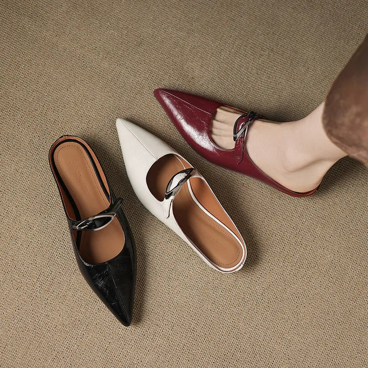 Leather mules set: black and maroon pointed-toe slip-ons with low block heels.