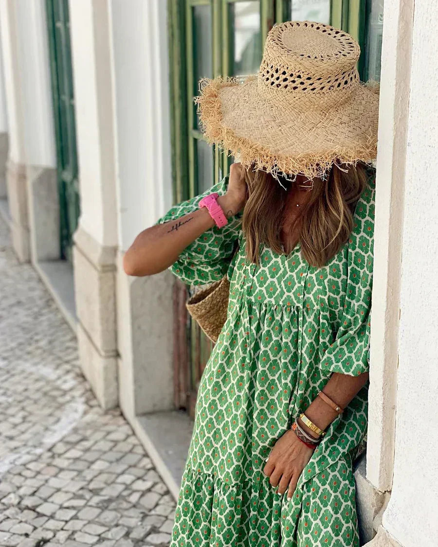 Green bohemian long dress with white geometric print, V-neck, loose three-quarter sleeves