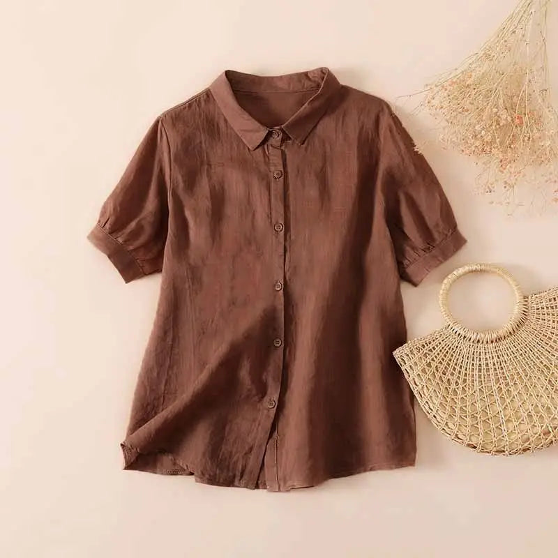 Brown short-sleeve button-up shirt with pointed collar and front buttons