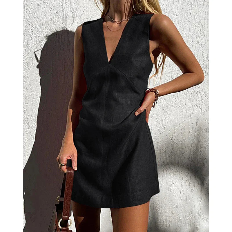 Black V-neck sleeveless mini dress with waist seam detail