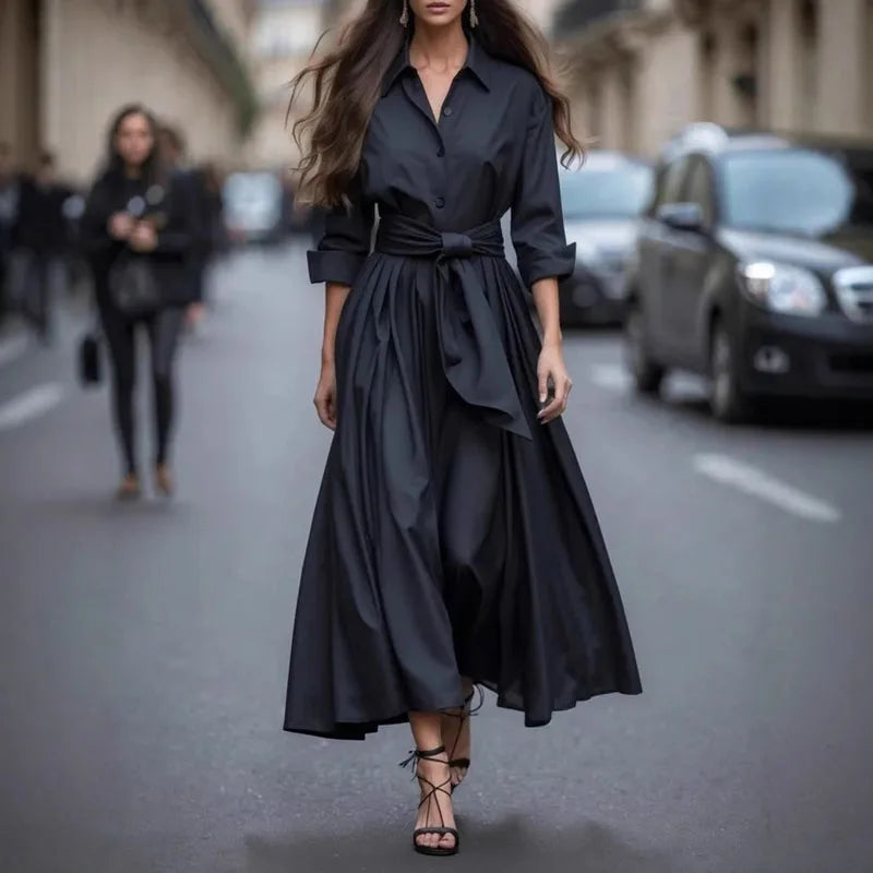 Black button-front maxi dress with shirt collar and tied waist, wide skirt