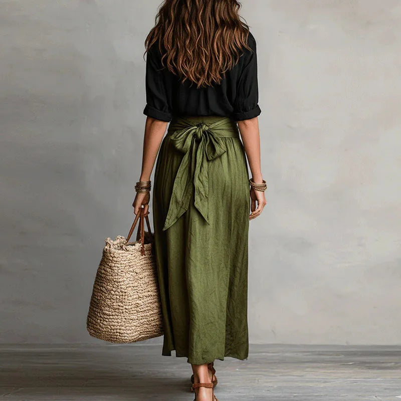 Two-tone maxi dress with black wrap-style back and olive green gathered skirt