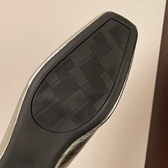 Lyra mules silver upper with black rubber sole tread