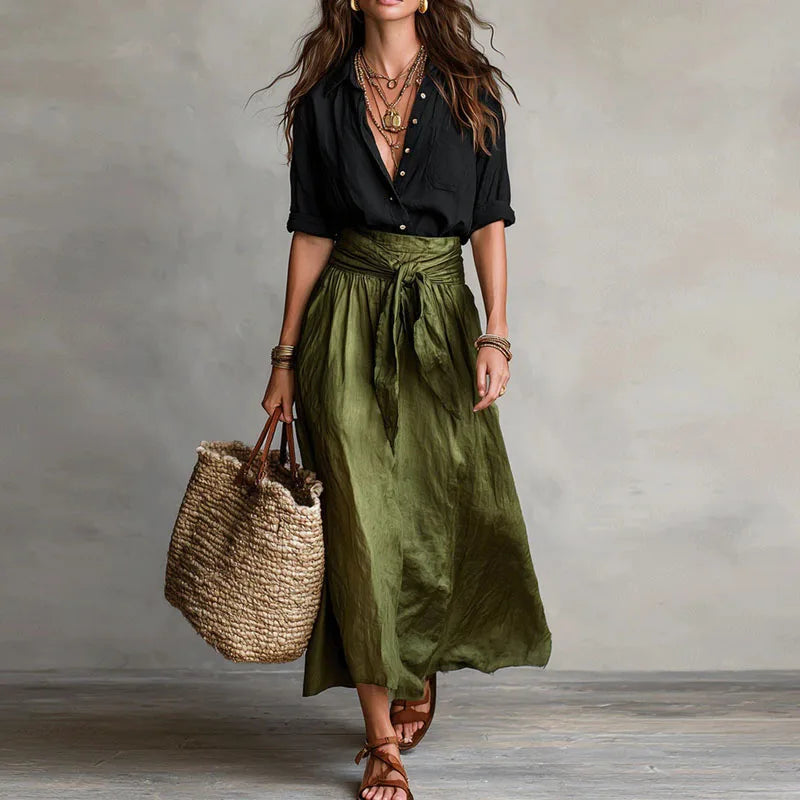 Two-tone maxi dress with black wrap-style bodice and dark olive gathered skirt