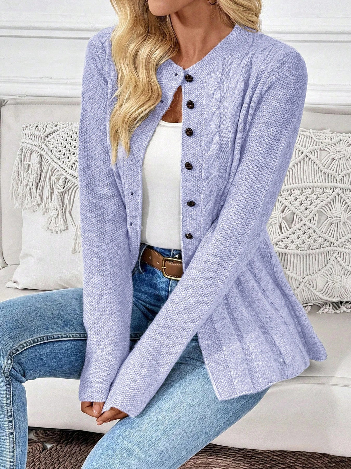 Lavender ribbed cardigan with button front, long sleeves, and peplum hem