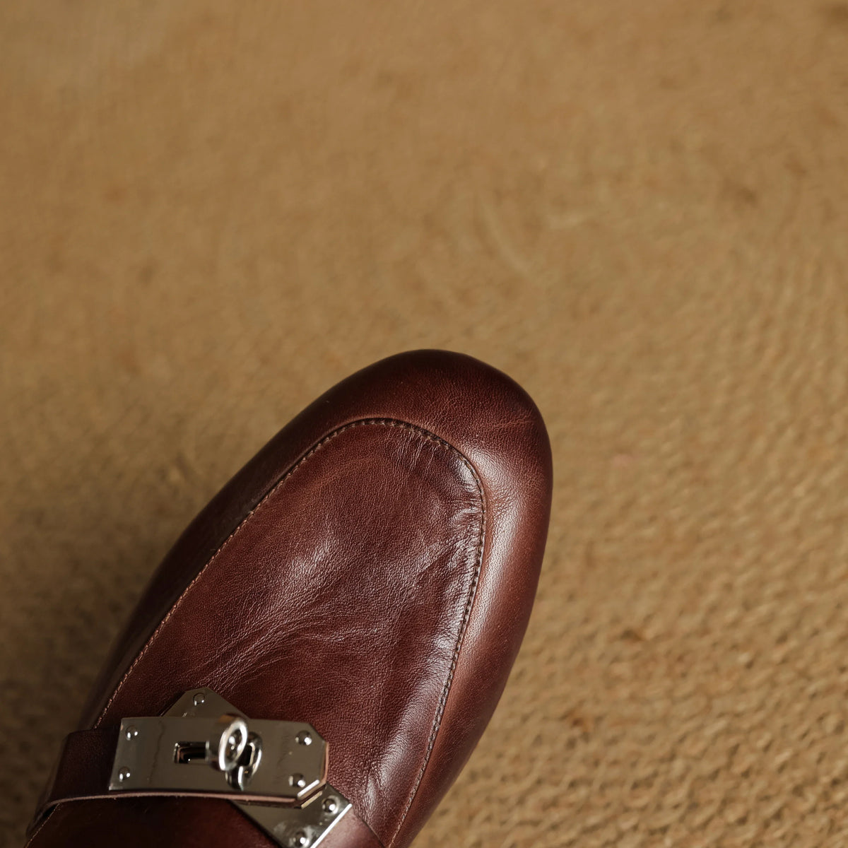 Maroon leather mule upper with silver buckle detail on strap
