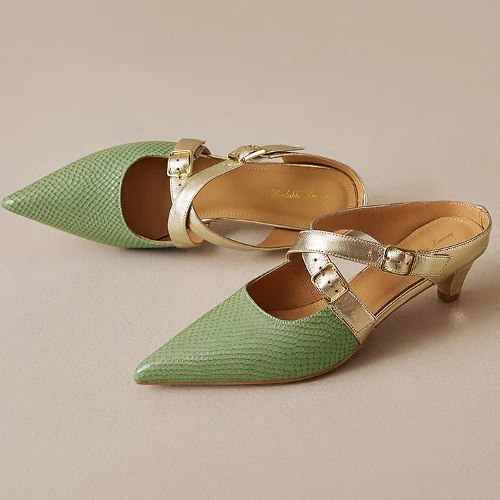 Green textured leather mules with pointed toe, gold buckles, and a low heel
