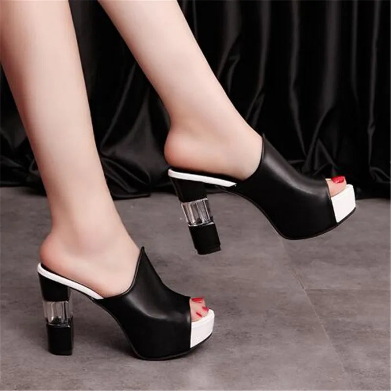 Black peep-toe heel mules with clear block heel and white platform