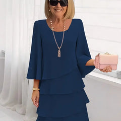 Navy blue ruffle tiered dress with flared sleeves and square neckline