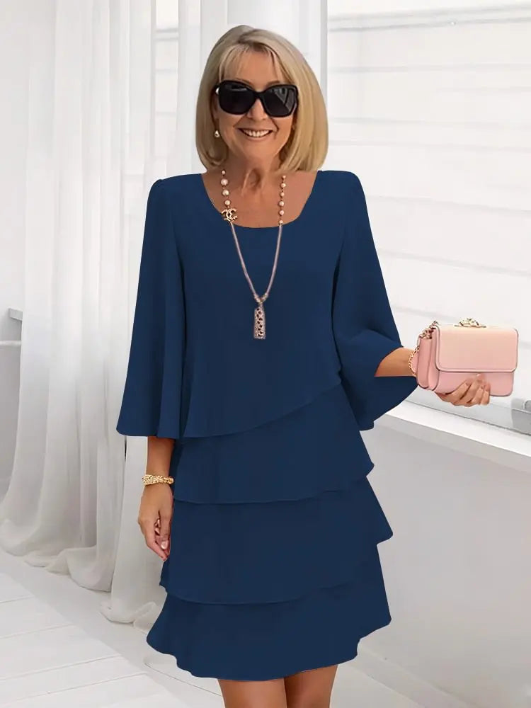 Navy blue ruffle tiered dress with flared sleeves and square neckline